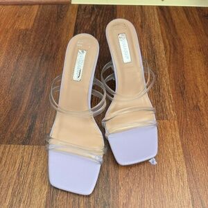 Lilac sandals with clear straps and heel
